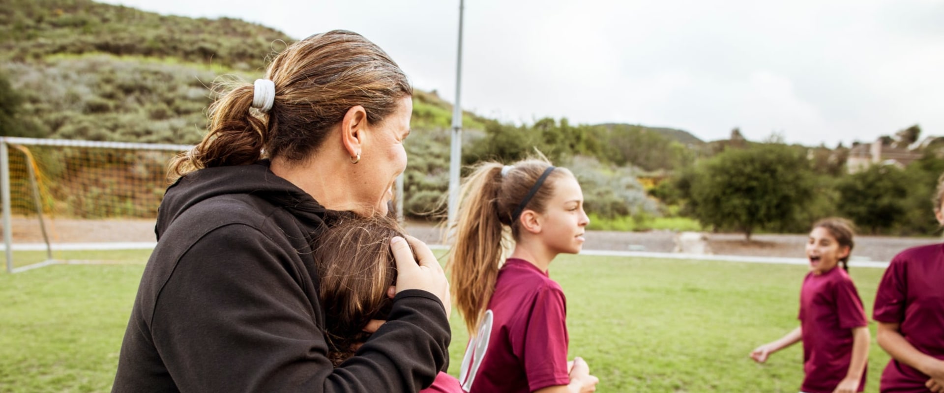 Why should a coach ensure a safe physical environment?